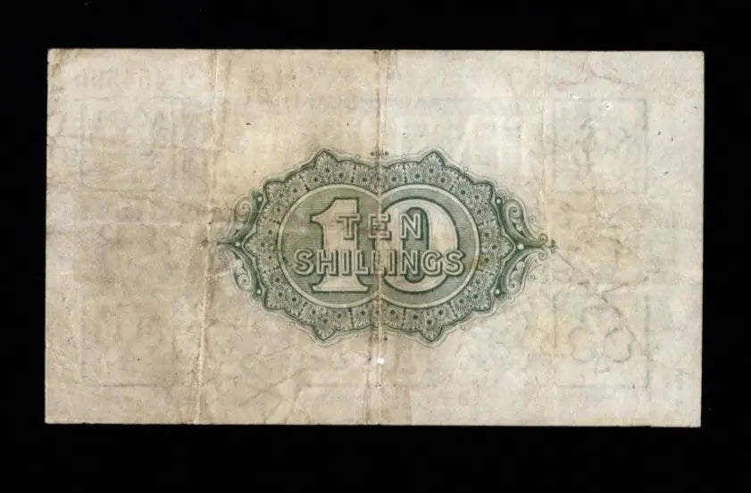 Front of 1923 Great Britain 10 Shillings banknote featuring King George V, Britannia, and serial number G/27 454590