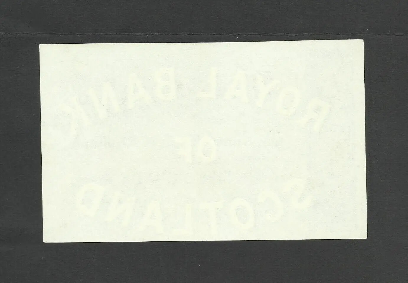 Back of a 1964 Scottish 5 Pound note showing the paper texture and visible watermark.