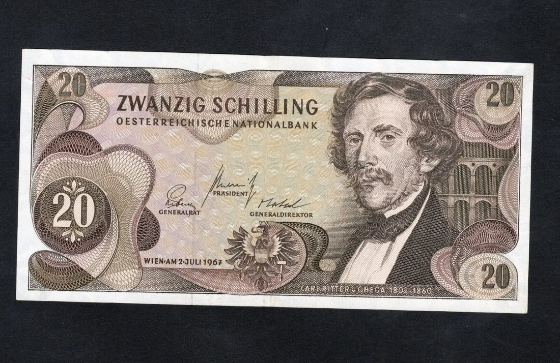 Circulated 1967 Austria 20 Schilling banknote featuring Carl Ritter von Ghega and the Semmering Railway bridge.