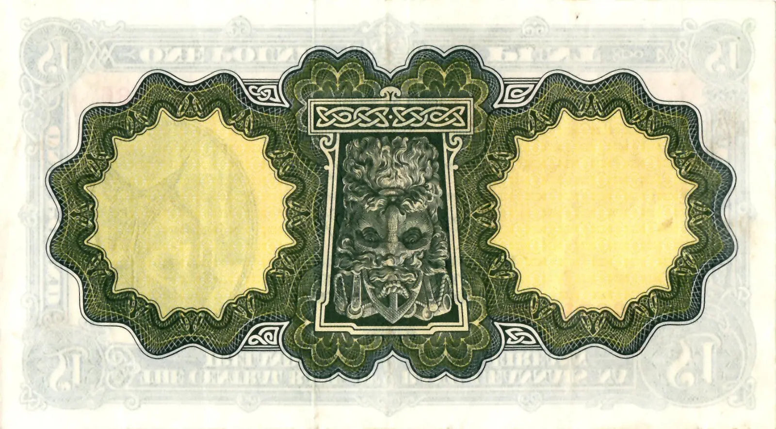 Reverse of a 1975 Irish Punt note showing the River God Erne mask and Celtic knotwork.