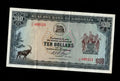 Front of 1975 Rhodesia 10 Dollar banknote featuring a Sable Antelope and serial number J/36 488523