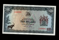 Front of 1975 Rhodesia 10 Dollar banknote featuring a Sable Antelope and serial number J/37 649592.
