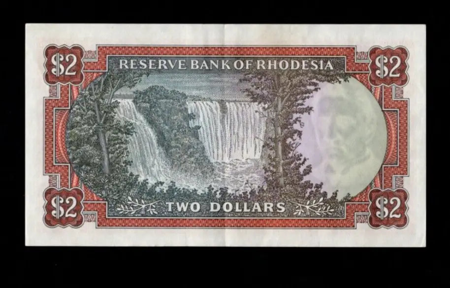 Reverse of 1975 Rhodesia 2 Dollar note featuring a detailed view of Victoria Falls.