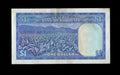 Reverse of 1978 Rhodesia 1 Dollar note showing a tobacco plantation field and mountain range.