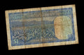 Reverse of a 1978 Rhodesia 1 Dollar note showing a tobacco field and mountain landscape.