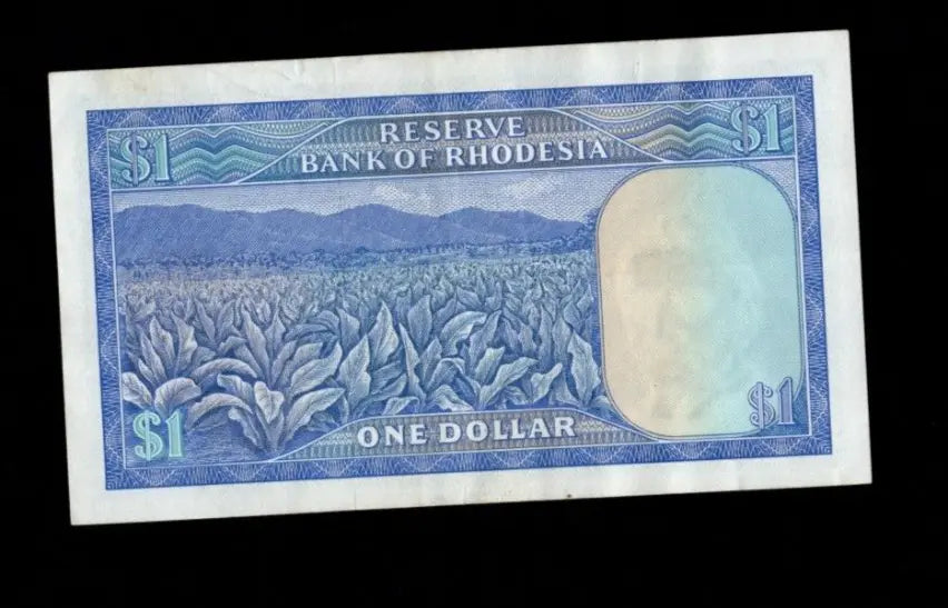 Front of a circulated 1978 Rhodesia 1 Dollar banknote featuring the Balancing Rocks and serial number L/100 404023.