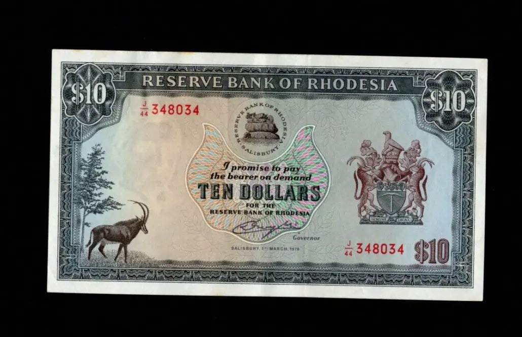 Front of 1978 Rhodesia 10 Dollar banknote featuring a Sable Antelope and red serial numbers.