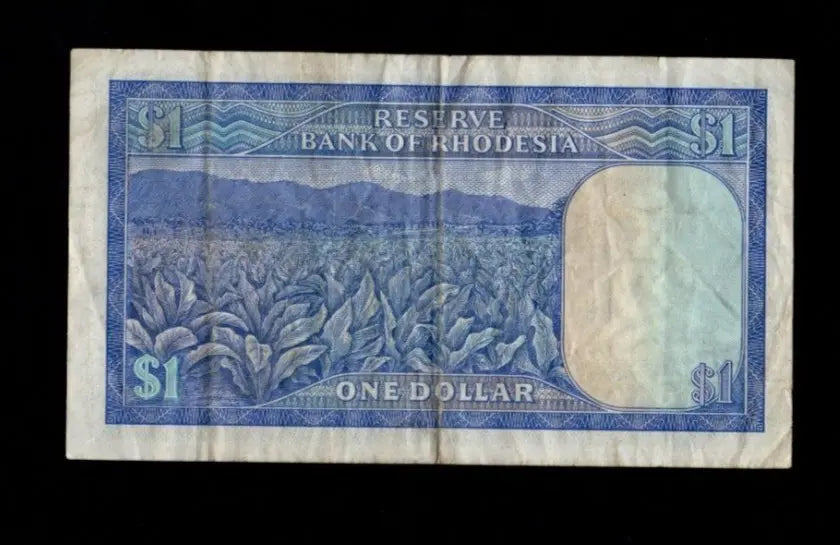 Reverse of 1979 Rhodesia 1 Dollar banknote showing a tobacco plantation field.