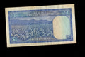 Reverse of 1979 Rhodesia 1 Dollar note showing a tobacco plantation and mountain landscape
