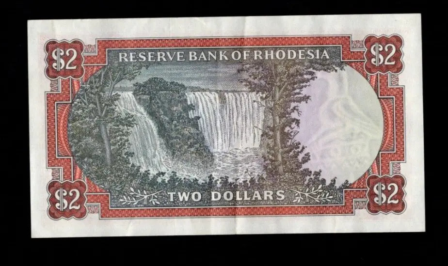 Front of 1979 Rhodesia 2 Dollar banknote featuring the Flame Lily and serial number K/155 676725