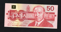 Front of 1988 Canada 50 Dollar banknote featuring William Lyon Mackenzie King and the Parliament Buildings