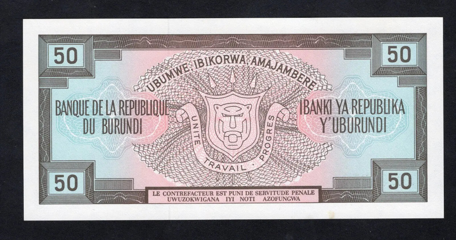 Uncirculated 1991 Burundi 50 Francs banknote featuring a traditional drummer and the national coat of arms.