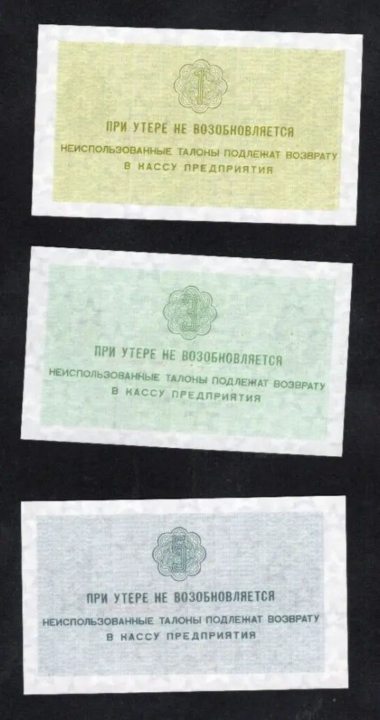 Actual photo of a set of 1946 Arktikugol Spitsbergen coal mine tokens, 1, 3, and 5 Kopecks, in Uncirculated condition.