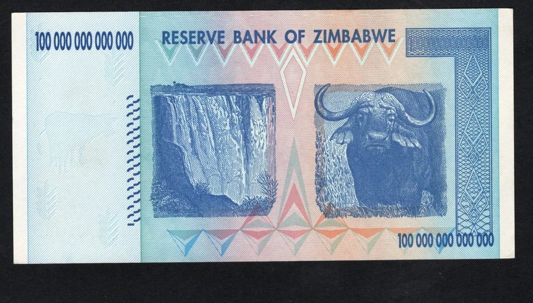 front of Zimbabwe 100 Trillion Dollar banknote. Genuine, AUNC AA Serial Number UV checked