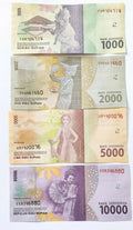 Indonesian rupiah banknotes 1000, 2000, 5000, 10000 with traditional cultural designs