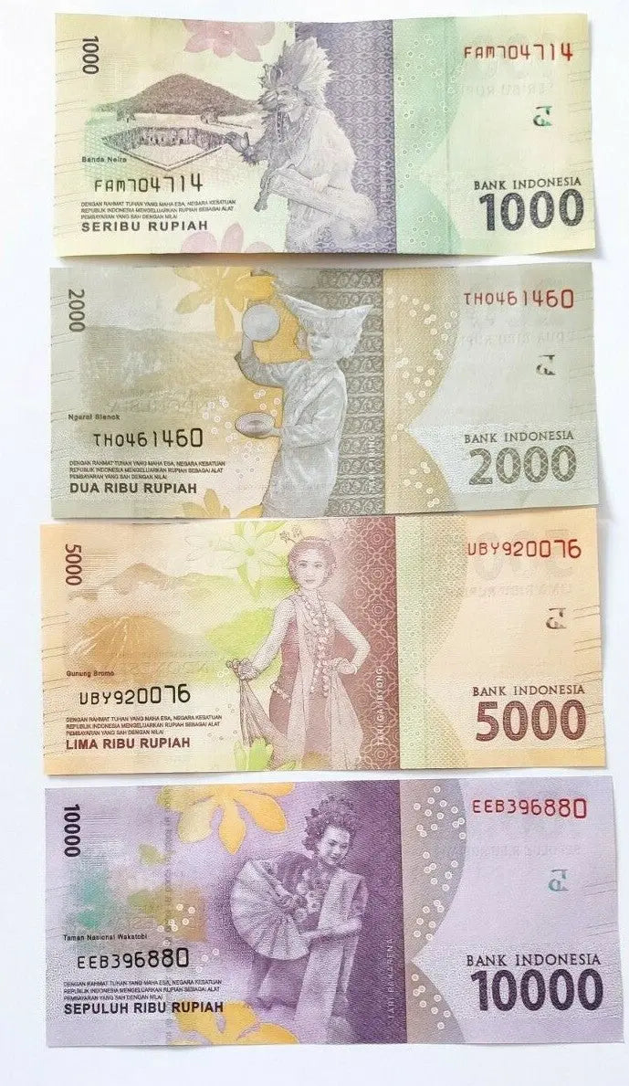 Indonesian rupiah banknotes 1000, 2000, 5000, 10000 with traditional cultural designs
