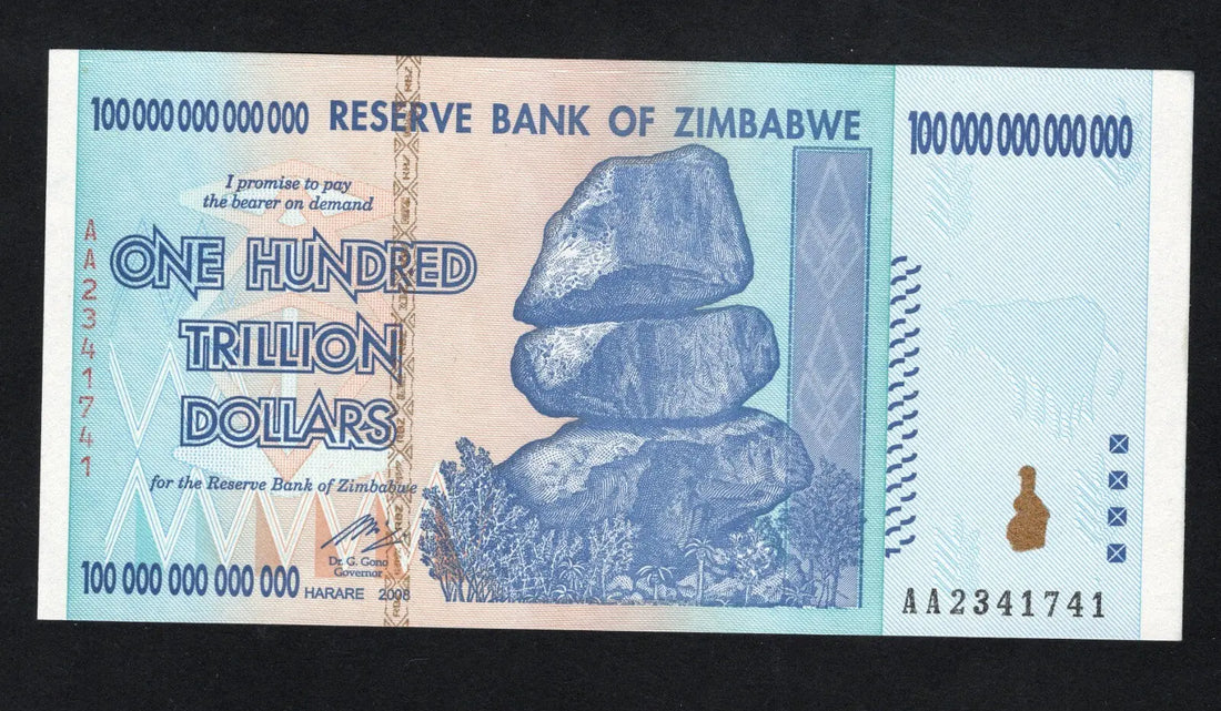 front of Zimbabwe 100 Trillion Dollar banknote. Genuine, AUNC AA Serial Number UV checked
