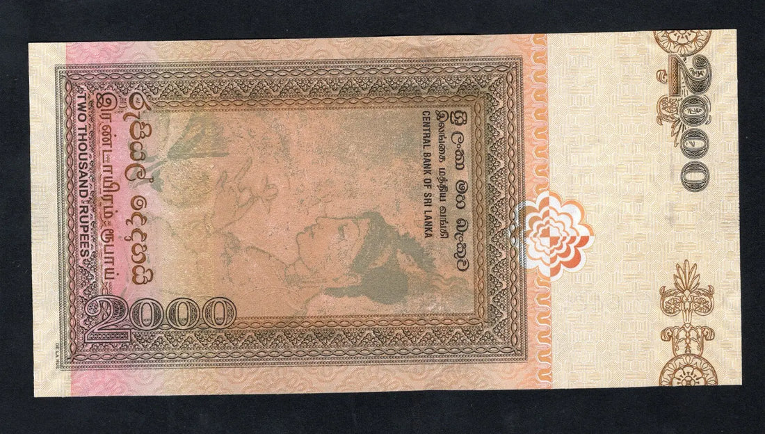 Actual photo of Sri Lanka 2000 Rupees banknote, 2005 issue, Pick 120a, serial P/3 684444, Sigiriya Rock and Elephant design, Uncirculated.