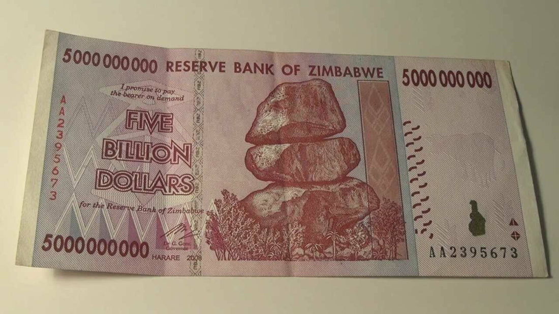 Zimbabwe five billion dollars banknotes used - worldbanknote