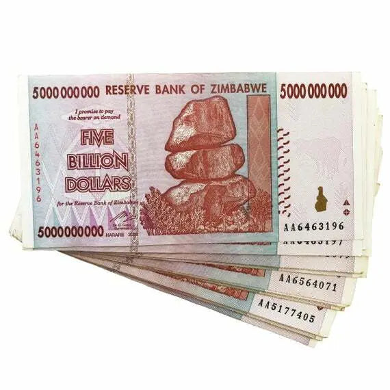 Stack of Zimbabwe five billion dollar banknotes, collectible world currency