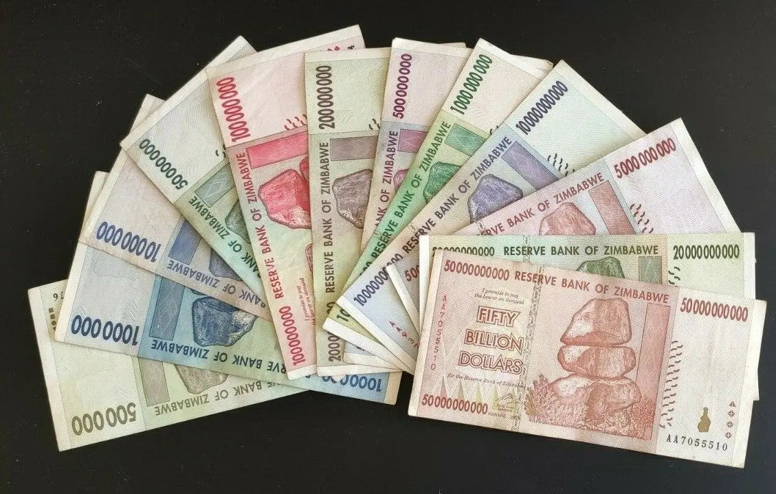 Zimbabwe banknotes assortment, high denomination world currency notes on black background