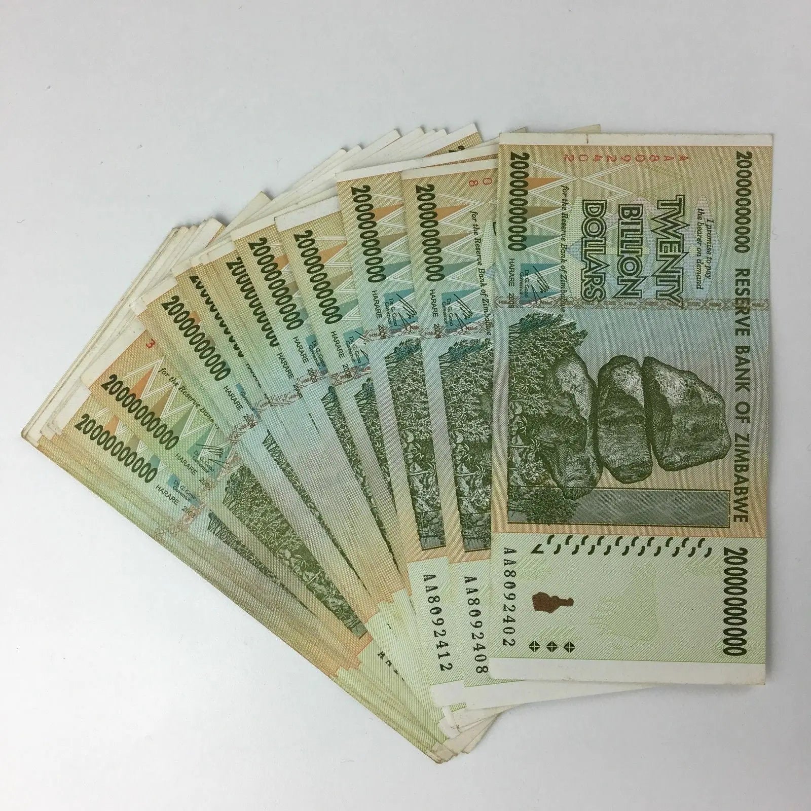 Fan of Zimbabwe twenty billion dollar banknotes, collectible world currency on white background