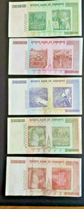 Collection of Zimbabwe banknotes with various denominations and colorful designs