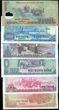 Vietnamese dong banknotes collection featuring various denominations and industrial scenes.