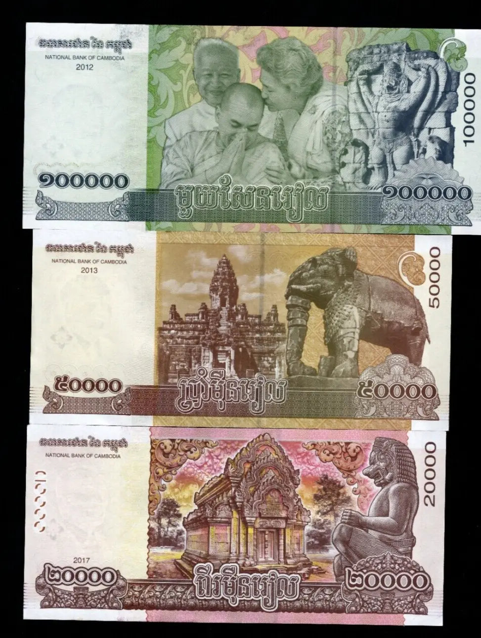 A set of 3 Cambodia Riel banknotes (100,000, 50,000, and 20,000) featuring King Norodom Sihamoni and King Father Norodom Sihanouk.