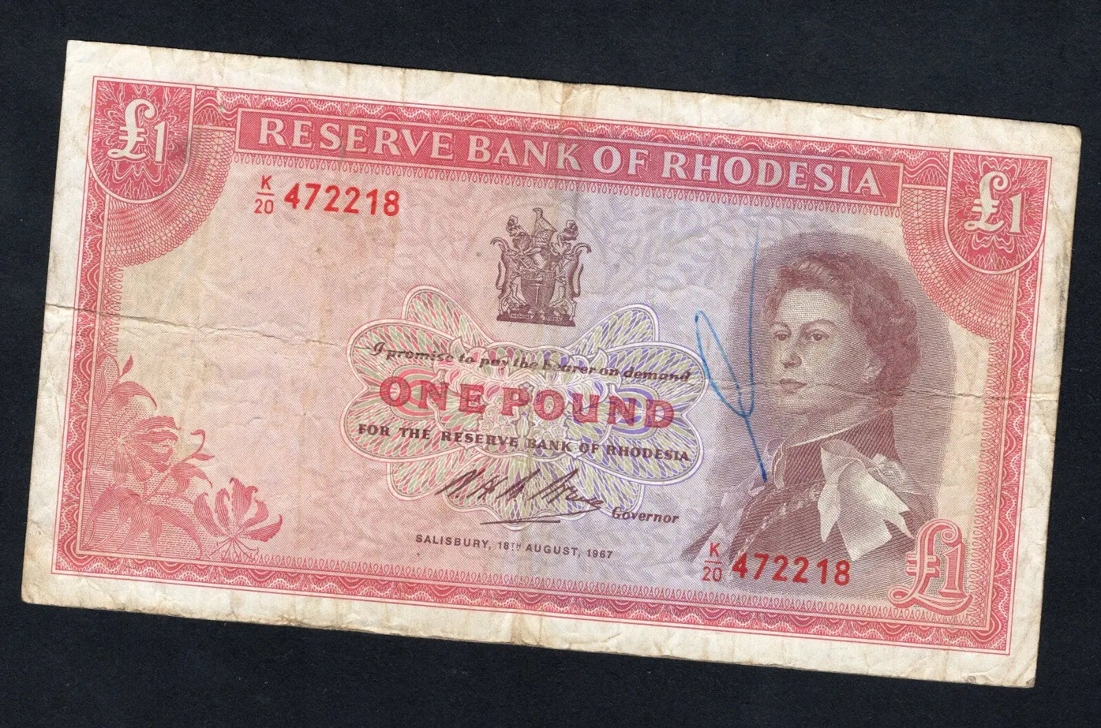 front of RESERVE BANK OF RHODESIA ONE POUND VERY FINE/ref d11