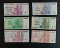 Zimbabwe hyperinflation banknotes collection, denominations from 500 million to 50 billion dollars on black background.