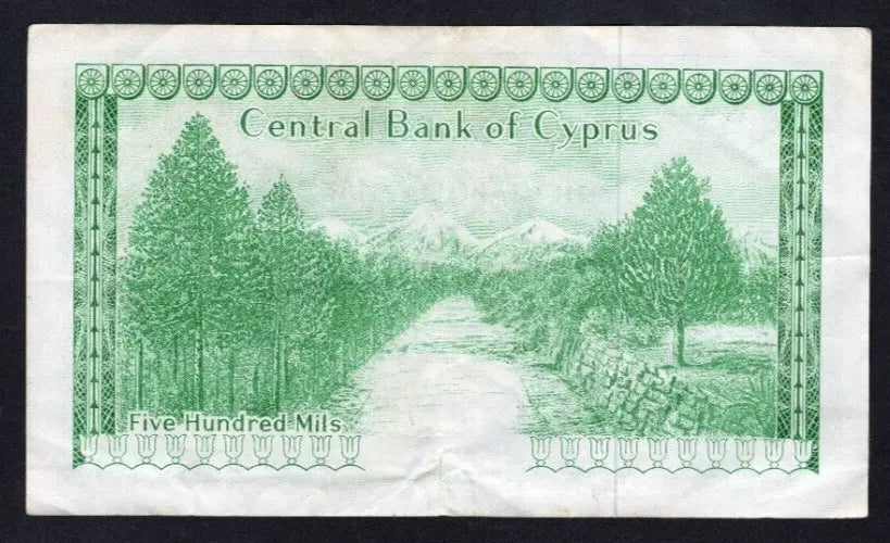 Obverse of a 1979 Cyprus 500 Mils banknote, serial number M/49 082719, showing green and multicolor patterns.