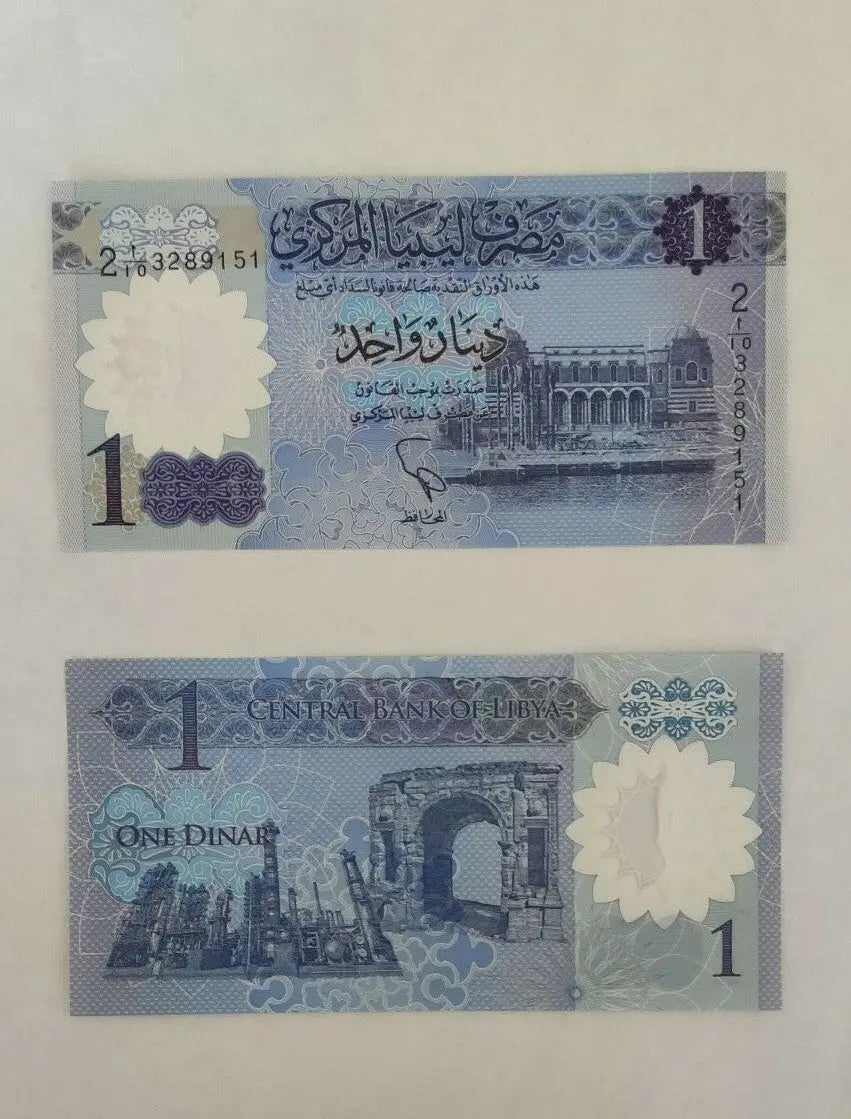 Libya 1 dinar banknote, front with historical building and Arabic text, back with Roman ruins.