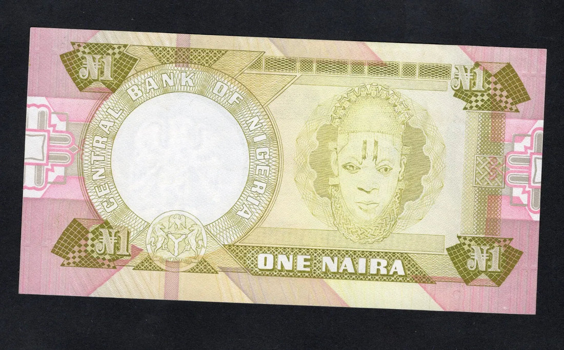 Actual photo of Nigeria 1 Naira 1979 banknote, Pick 21, Serial Number L/29 491748, featuring Herbert Macaulay in Uncirculated condition.