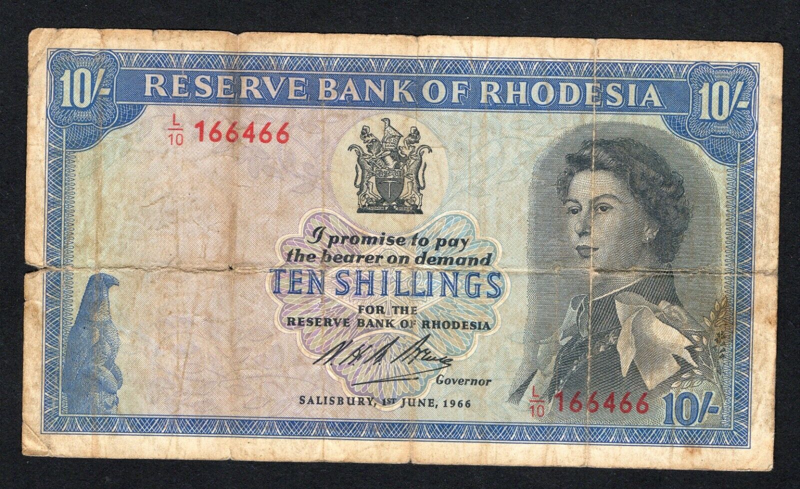 RESERVE BANK OF RHODESIA 10 SHILLING Well Used/damaged /ref d11