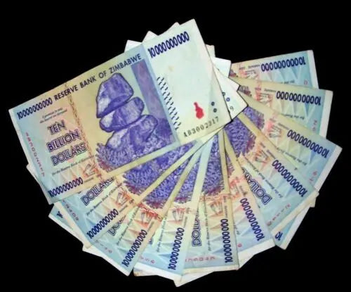 Zimbabwe Ten Billion Dollar banknotes fanned out on a black background, collectible currency