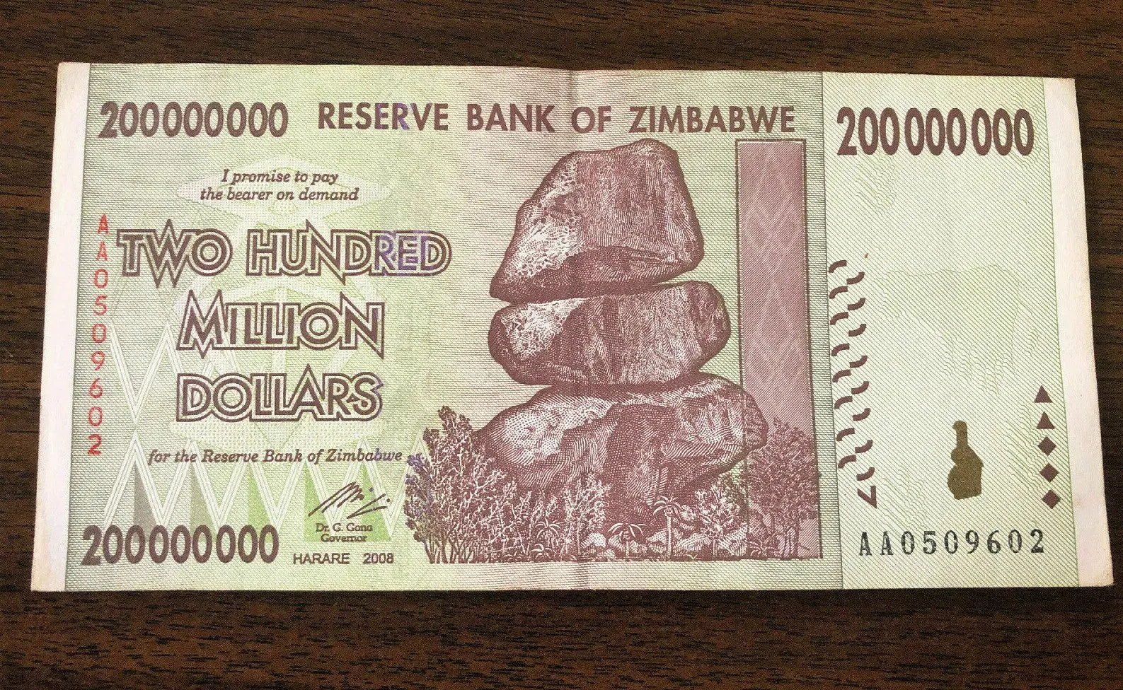 Zimbabwe 200 million dollar banknote with balancing rocks, collectible world currency