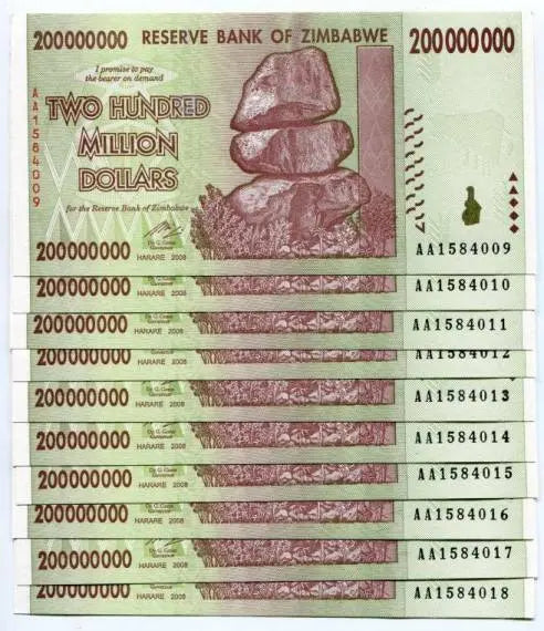 Stack of Zimbabwe 200 million dollar banknotes with balancing rocks design