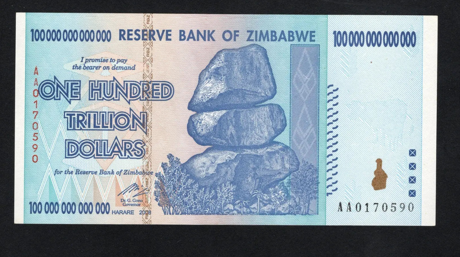 front of Zimbabwe 100 Trillion Dollar banknote. Genuine, AUNC AA Serial Number UV checked
