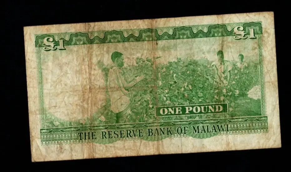 Front and back of a circulated 1964 Malawi 1 Pound banknote featuring President Hastings Banda and Lake Malawi.