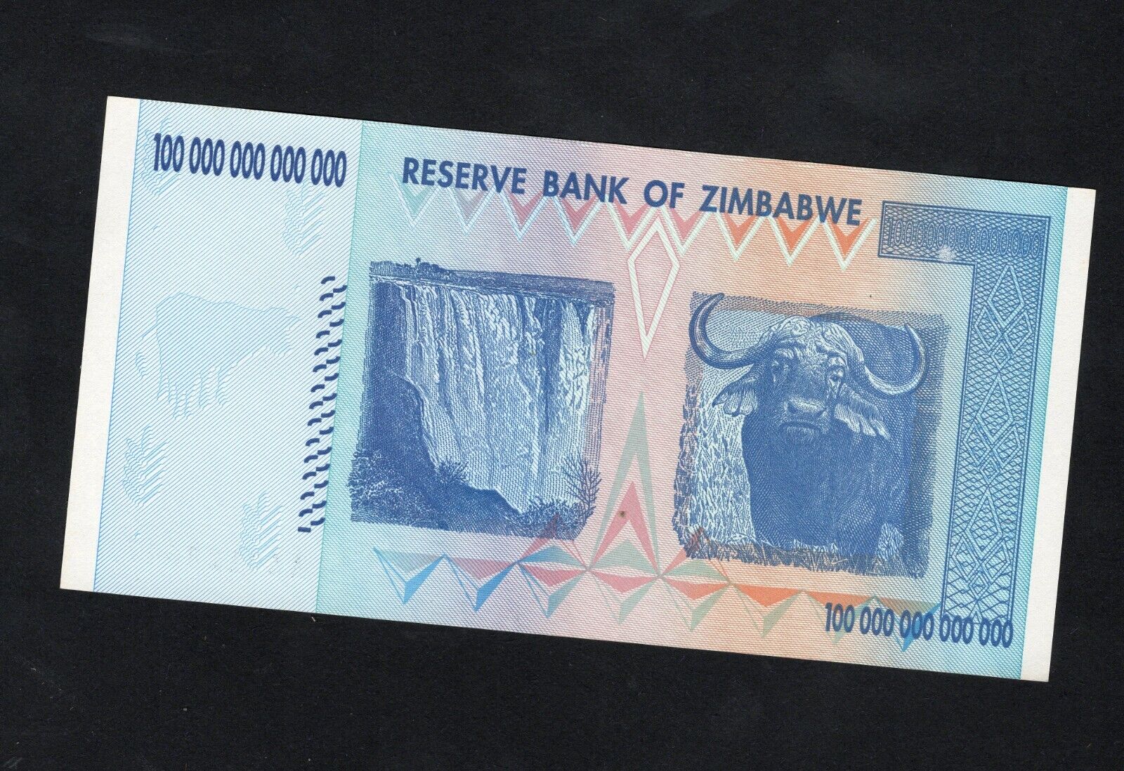 Zimbabwe 100 Trillion Dollar banknote. Genuine, AUNC AA Serial Number UV checked - worldbanknote
