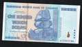 front of Zimbabwe 100 Trillion Dollar banknote. Genuine, AUNC AA Serial Number UV checked