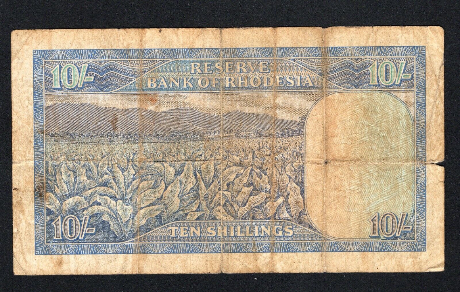RESERVE BANK OF RHODESIA 10 SHILLING Well Used/damaged /ref d11