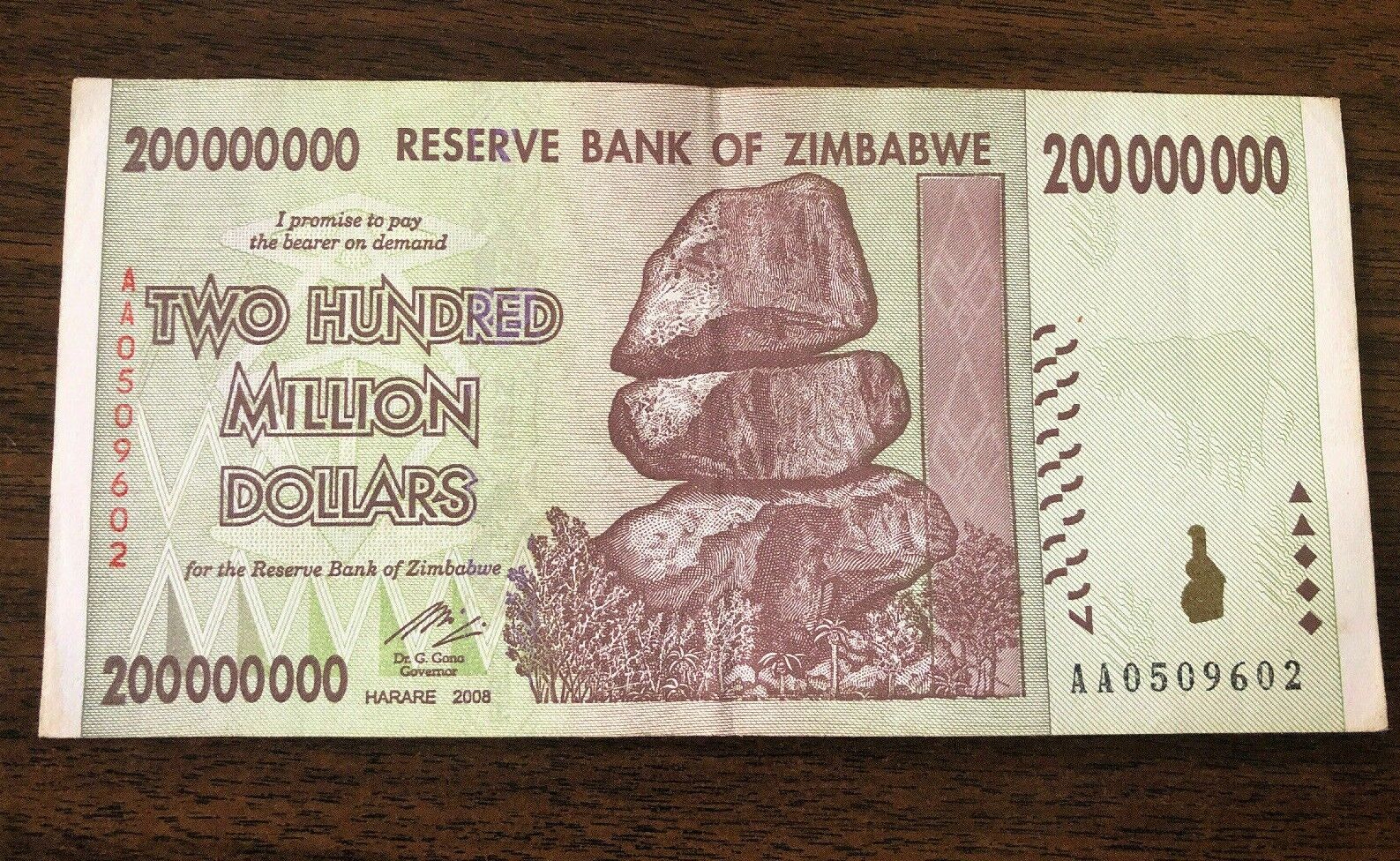 Zimbabwe 200 hundred million dollars banknotes used - worldbanknote