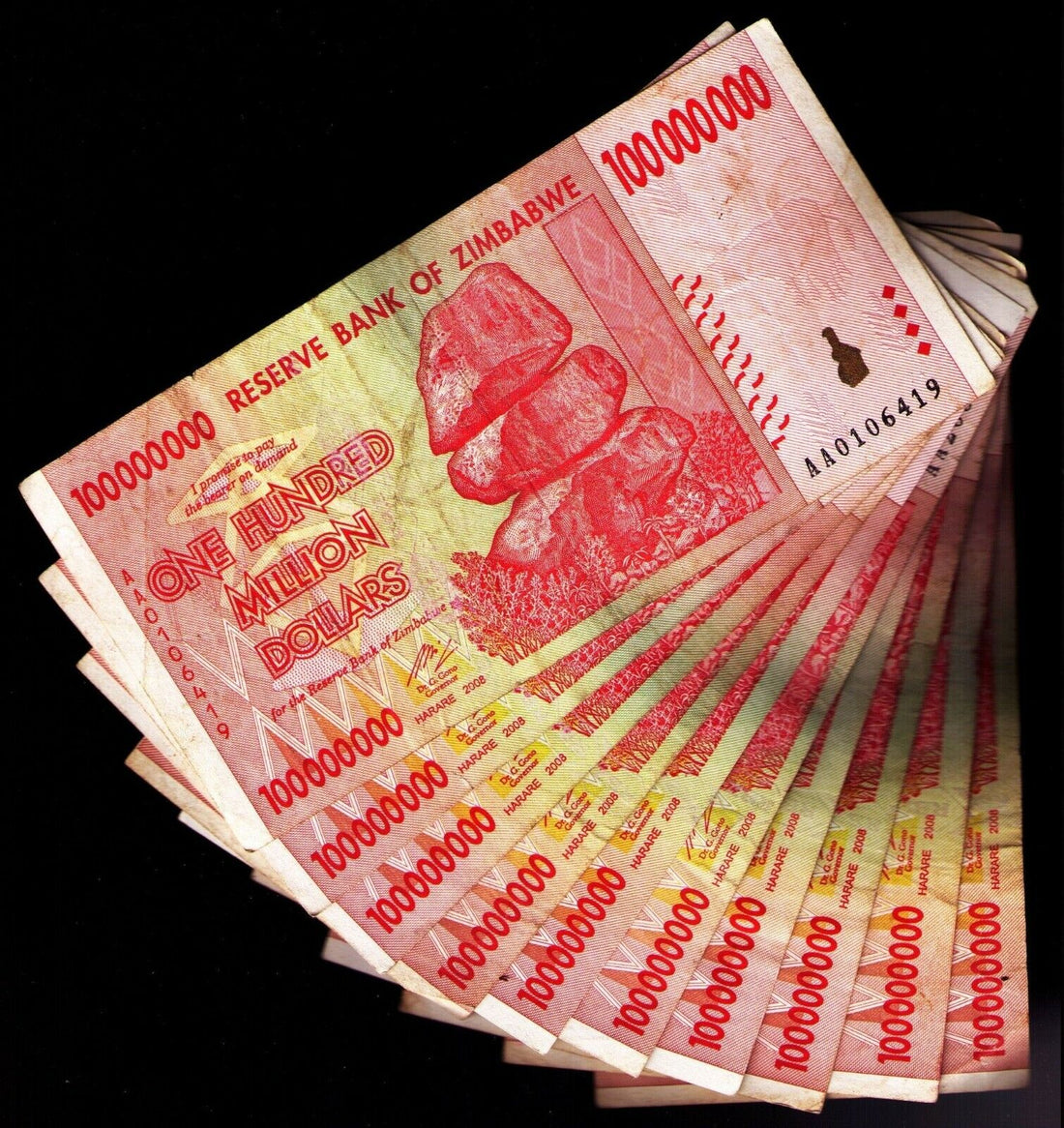 Zimbabwe 10xone hundred million dollars banknotes used - worldbanknote