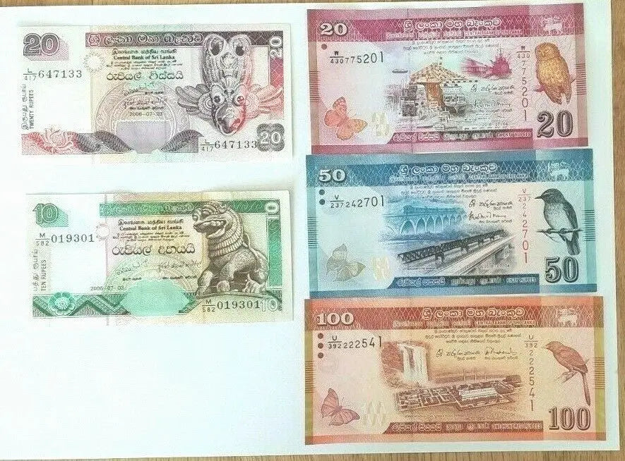 Assorted Sri Lankan banknotes featuring animals, landmarks, birds, and vibrant colors.