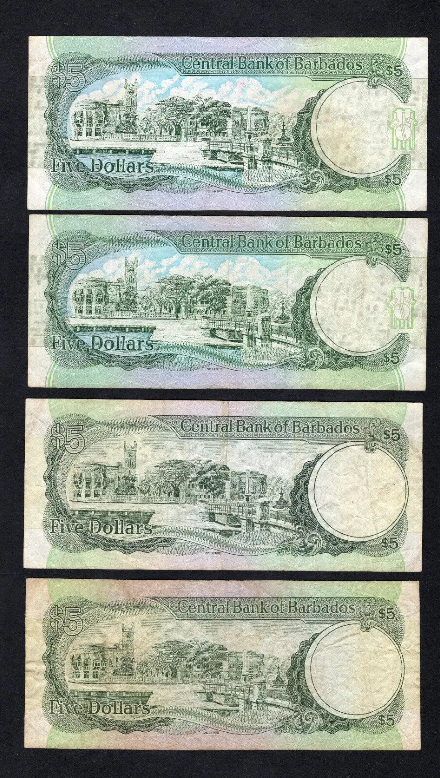 Four circulated Barbados 5 Dollar banknotes featuring Sir Frank Worrell. Set includes both Calvin Springer and Marion Williams signature varieties with different numeral sizes.1