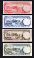 A collection of four circulated Barbados banknotes ($1, $2, $5, $10) featuring historical figures like Sir Frank Worrell and Samuel Jackman Prescod.