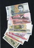 SA collection of 8 Cambodian Riel banknotes from 1979 to 2022, featuring King Sihamoni and Angkor Wat landmarks.