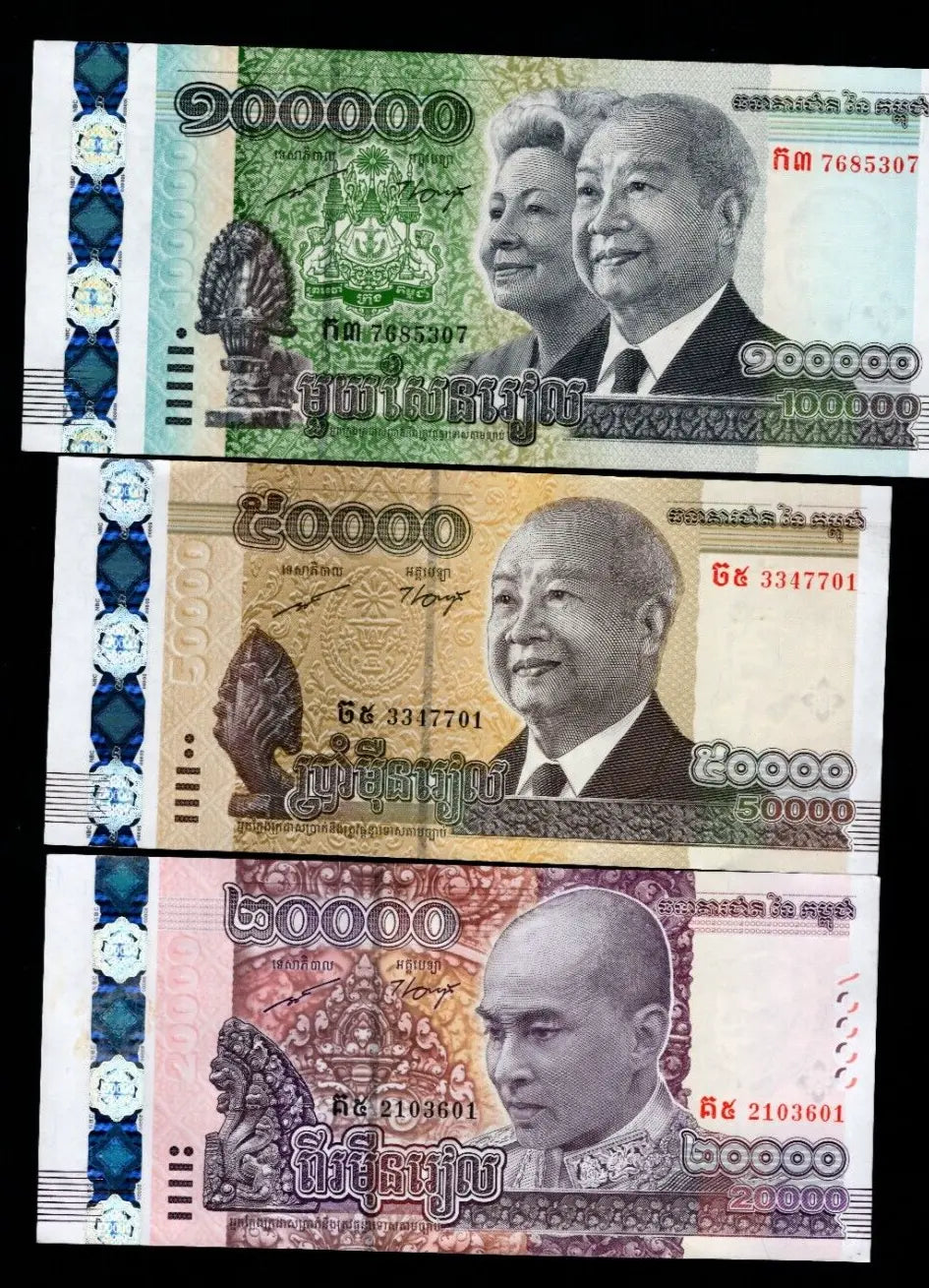 A set of 3 Cambodia Riel banknotes (100,000, 50,000, and 20,000) featuring King Norodom Sihamoni and King Father Norodom Sihanouk.
